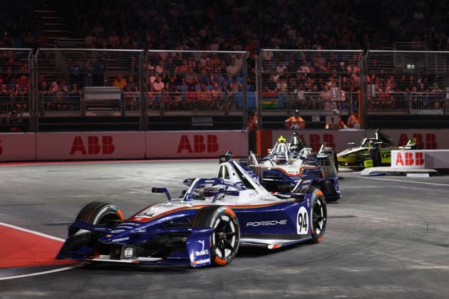 Pascal Wehrlein (GER) in Porsche 94 and Nico Mueller (SUI) in Porsche 51 lead Race 1 of the FIA Formula E World Championship, Season 12, London E-Prix, August 15, 2026, at the Excel Exhibition Center