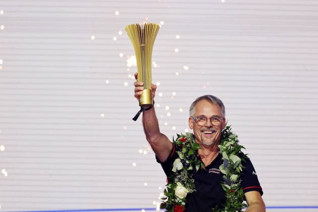 Thomas Laudenbach (GER) of Porsche Motorsport, unfortunately, on the podium with the team trophy, Race 1, FIA Formula E World Championship, Season 12, London E-Prix, August 15, 2026, Excel Exhibition Center, Porsche victory