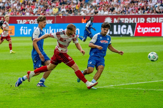 August 15, 2026, xkkux, Soccer, Fortuna Düsseldorf vs. TSG 1899 Hoffenheim II, 3. Liga, MERKUR SPIEL ARENA, Matchday 2, 2026–2027 Season: Eric Hottmann of Fortuna Düsseldorf 09 in a tackle against Yasin Zor of TSG Hoffenheim II 10. DFB regulations prohibit any use of photographs as image sequences and or quasi-video. North Rhine-Westphalia, Germany