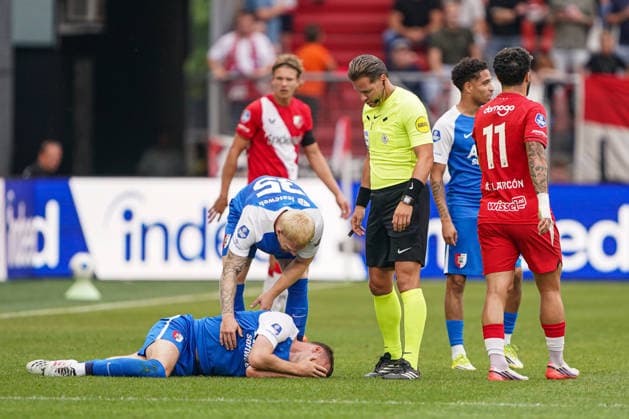 2026-8-15 FC Utrecht v AZ Alkmaar - Dutch Vriendenloterij Eredvisie UTRECHT, NETHERLANDS - AUGUST 15: Peer Koopmeiners of AZ Alkmaar lies on the ground with an injury during the Dutch Vriendenloterij Eredvisie match between FC Utrecht and AZ Alkmaar at Stadion Galgenwaard on August 15, 2026 in Utrecht, Netherlands. Utrecht Stadion Galgenwaard Netherlands Content not available for redistribution in The Netherlands directly or indirectly through any third parties. Copyright: xAndrexWeeningx