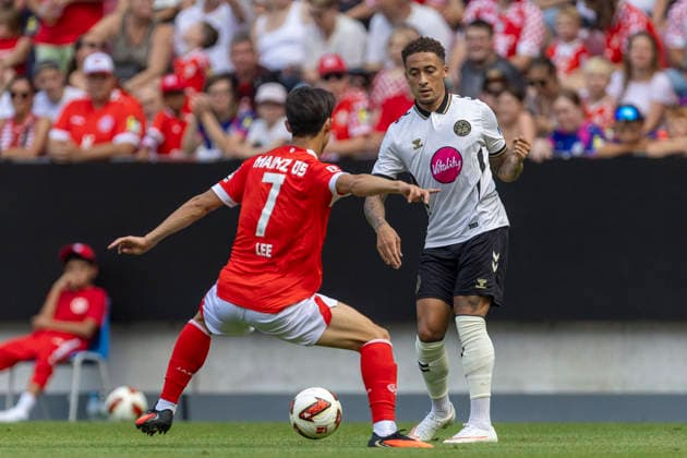 GER, Mainz, Soccer, Friendly Match, FSV Mainz 05 vs. AFC Bournemouth (pictured, from left): Jae Sung Lee (FSV Mainz 05, 07), Marcus Tavernier (AFC Bournemouth, 16), tackle, August 15, 2026, MEWA Arena Mainz DFL DFB REGULATIONS PROHIBIT ANY USE OF PHOTOGRAPHS AS IMAGE SEQUENCES AND OR QUASI-VIDEO, Copyright: HMBxMedia PaulxFritz