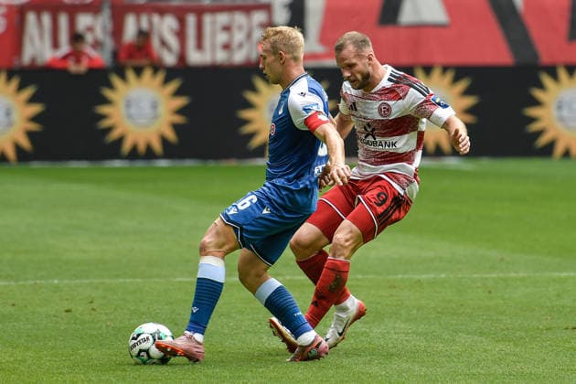 From left in a one-on-one situation: Valentin Lässig (Hoffenheim 6), Eric Hottmann (Düsseldorf 9), August 15, 2026 ¢ Soccer ¢ Fortuna Düsseldorf vs. TSG 1899 Hoffenheim II, Merkur Spiel Arena, Düsseldorf, DFB and DFL regulations prohibit any use of photographs as image sequences and or quasi-video. NRW, Germany Copyright: xpepphotox xSaschaxWeizx pep00321, pep_20260815_hm_55164