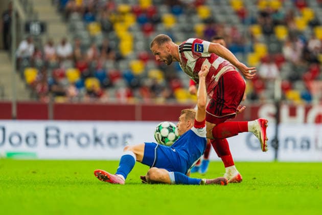 Valentin Laessig (TSG Hoffenheim II, No. 06) in a tackle with Eric Hottmann (Fortuna Düsseldorf, No. 09), Fortuna Düsseldorf vs. TSG Hoffenheim II, Soccer, 3. Liga, Matchday 2, 2026–27 Season, August 15, 2026 DFL regulations prohibit any use of photographs as image sequences and or quasi-video, Fortuna Düsseldorf vs. TSG Hoffenheim II, soccer, 3. Liga, Matchday 2, 2026–27 Season, August 15, 2026, Düsseldorf Copyright: xEibner-Pressefoto LukasxBaldygax EP_LBA