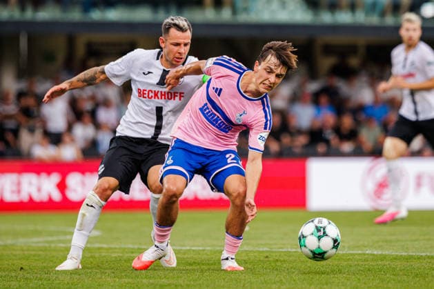 L R Niko Kijewski (SC Verl), 19, in a tackle with Simon Symalla (MSV Duisburg), 23, GER, SC Verl vs. MSV Duisburg, Soccer, 3rd Division, Matchday 2, 2026–2027 Season, August 15, 2026 DFL regulations prohibit any use of photographs as image sequences and or quasi-video GER, SC Verl vs. MSV Duisburg, Soccer, 3rd Division, Matchday 2, 2026–2027 season, August 15, 2026, Verl Copyright: xEibner-Pressefoto JanxRollingerx EP_JSK