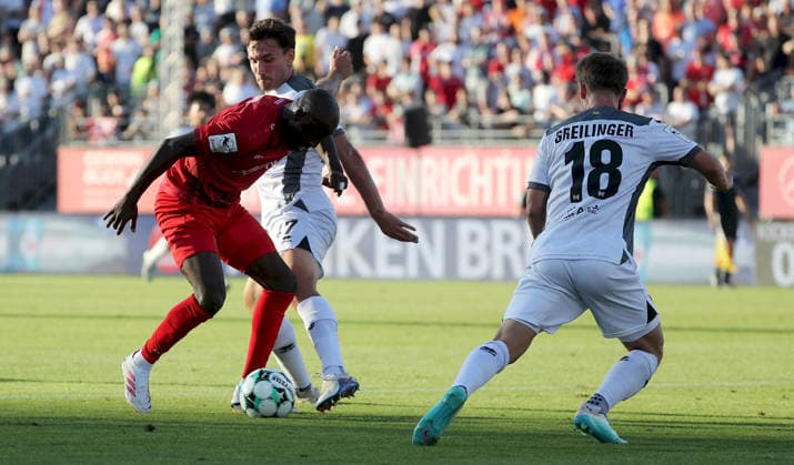 August 14, 2026, xfsx, Men s, Soccer, 2026–2027 Season, 3rd Division, Matchday 2: FC Würzburger Kickers vs. SV Wehen Wiesbaden; from left: David Kinsombi (FC Würzburger Kickers), David Suarez (SV Wehen Wiesbaden), Fabian Greilinger (SV Wehen Wiesbaden); Würzburg, AKON ARENA, Bavaria, Germany
