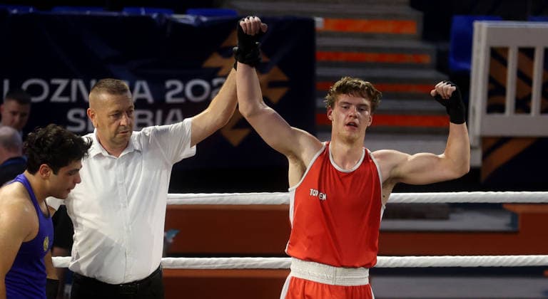 15.08.2026 Loznica(Serbia) European Junior U19 boxing championship Man s -90kg Rade Vujovic(C) Crnogorski sudija.Montenegro referee ,Markuss Reke (R) Latvia celebrate victory :
