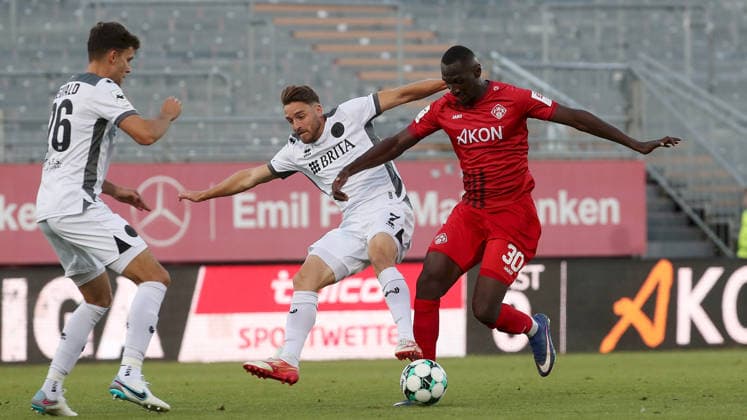August 14, 2026, xfsx, Men s, Soccer, 2026–2027 Season, 3rd Division, Matchday 2: FC Würzburger Kickers vs. SV Wehen Wiesbaden; from left: Jakob Lewald (SV Wehen Wiesbaden), Lukas Schleimer (SV Wehen Wiesbaden), Tarsis Bonga (FC Würzburger Kickers); Würzburg, AKON ARENA, Bavaria, Germany