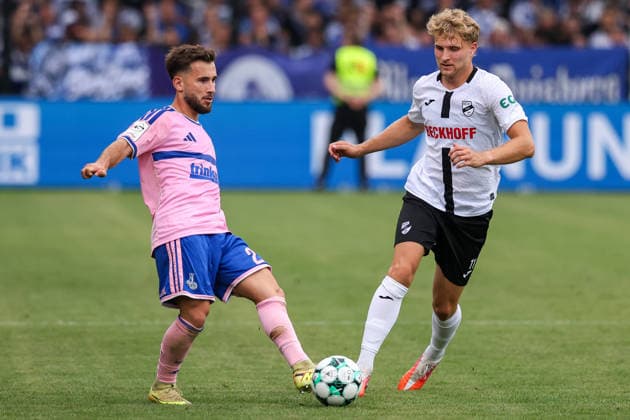 August 15, 2026, xkwix, Soccer, 3rd Division, SC Verl vs. MSV Duisburg, Sportclub Arena, Matchday 2, 2026–2027 Season: Can Coskun (MSV Duisburg 27) in a tackle against Moritz Kaube (SC Verl 11). DFB regulations prohibit any use of photographs as image sequences and or quasi-video. Photo: xKamilxWilkowskixPressefotoKochx, North Rhine-Westphalia, Germany