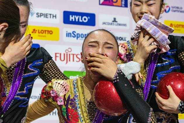 August 15, 2026, Frankfurt, Hesse, Germany: Japan team members, including HANAMURA Natsumi NATSUMI, MANABE RIN, NISHIMOTO MEGUMI, TAGUCHI HISANO, TANABE KASENO, and TANAKA YUNA, pose with their silver medals after finishing second in the 42nd Rhythmic gymnastics, Rhythmische Sportgymnastik, RSG World Championships group all-around finals in the Festhalle in Frankfurt, Hesse, Germany on Saturday, August 15, 2026. 2026 Rhythmic Gymnastics World Championships Group All-Around Finals - ZUMAd168 20260815_zsp_d168_030 Copyright: xKaixDambachx
