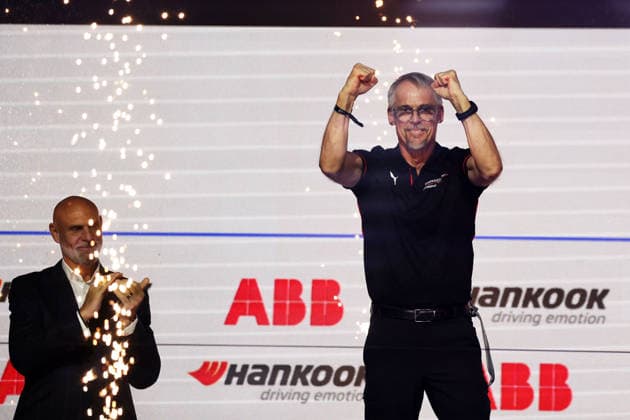 Jeff Dodds (GBR), CEO of FE, stands behind a jubilant Thomas Laudenbach (GER), Head of Porsche Motorsport, on the podium, Race 1, FIA Formula E World Championship, Season 12, London E-Prix, August 15, 2026, Excel Exhibition Center, Pascal Wehrlein s victory