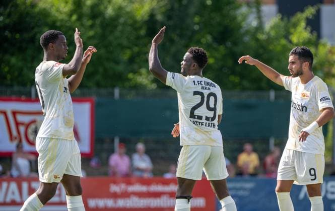 Soccer, Men s, 2026–2027 Season, Friendly Match in Salzburg (3 x 45 minutes), 1. FC Union Berlin 3, Aris Limassol FC 2; from left: Ilyas Ansah (1. FC Union), Emmanuel Latte Lath (1. FC Union Berlin), Livan Burcu (1. FC Union Berlin); celebration after the 1–1 goal, August 9, 2026, Copyright: xMatthiasxKochx