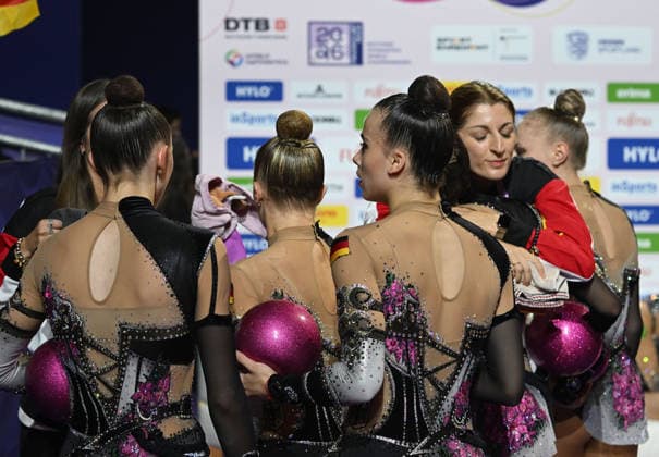 August 16, 2026, xhbx, 2026 Rhythmic Gymnastics World Championships, from left: Team, Group, Germany consists of Alisa Datsenko, Anja Kosan, Alina Ott, Helena Ripken, Anna Maria Shatokhin, 5-ball routine; group coach Camilla Pfeffer after the routine in Frankfurt am Main