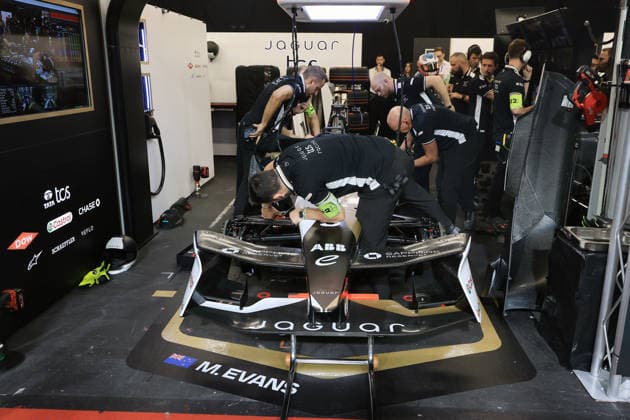 Mechanics are working on Mitch Evans NZL Jaguar in the pits due to a problem, FIA Formula E World Championship, Season 12, London E-Prix, August 16, 2026, Excel Exhibition Center, Free Practice 3
