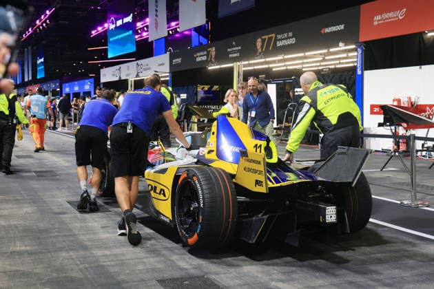 Mechanics push the Lola Yamaha, which came to a stop due to technical problems after retiring from the race, through the pit lane; FIA Formula E World Championship, Season 12, London E-Prix, August 16, 2026, Excel Exhibition Center, Free Practice 3