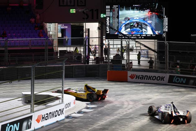 Lucas di Grassi (BRA) in a Lola Yamaha and Nico Mueller (SUI) in a Porsche at the final corner of the track, during free practice in the pit lane, FIA Formula E World Championship, Season 12, London E-Prix, August 16, 2026, Excel Exhibition Center,