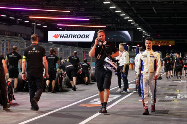 Max Schoner (GER), physical therapist, and Pascal Wehrlein (GER), Porsche driver, walk together through the pit lane after the third free practice session, FIA Formula E World Championship, Season 12, London E-Prix, August 16, 2026, Excel Exhibition Center,