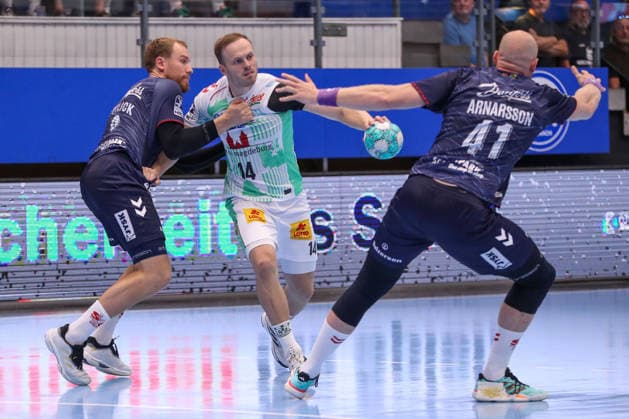 August 16, 2026, xgox, Handball Wartburg Cup: SC Magdeburg vs. SG Flensburg Handewitt, emspor; from left: Simon Pytlick (Flensburg), 2; Omar Ingi Magnusson (Magdeburg), 14; duel, battle, tackle, Eisenach