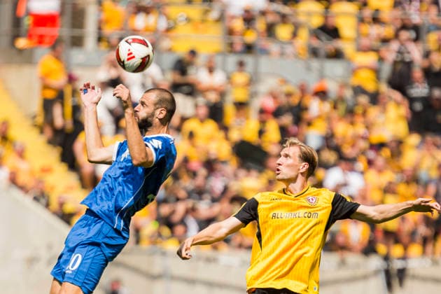 August 16, 2026, xomx, Soccer 2. Bundesliga, Dynamo Dresden vs. SV Darmstadt 98 – Aleksandar Vukotic, SV Darmstadt 98, heads the ball; Vincent Vermeij, Dynamo Dresden. DFL DFB regulations prohibit any use of photographs as image sequences and or quasi-video. Dresden