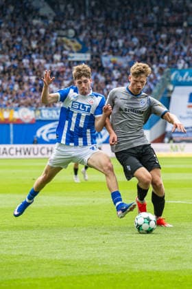 Rostock, Germany, August 16, 2026; 3. Liga 2026–2027, Matchday 2: FC Hansa Rostock vs. SV Waldhof Mannheim. Pictured, from left, in a tackle: Bernie Lennemann of Hansa Rostock and Moritz Polte of Waldhof Mannheim. Copyright: xFotostandx xVoelkerx