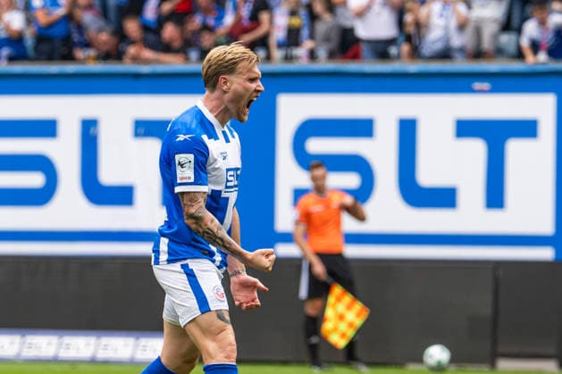 Rostock, Germany, August 16, 2026; 3. Liga 2026–2027, Matchday 2: FC Hansa Rostock vs. SV Waldhof Mannheim. Pictured: Andreas Voglsammer of Hansa Rostock celebrates after scoring the goal that made the score 1–2. Copyright: xFotostandx xVoelkerx