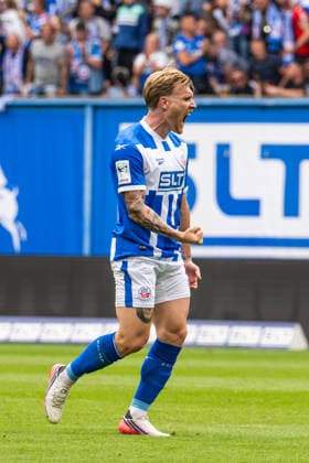 Rostock, Germany, August 16, 2026; 3. Liga 2026–2027, Matchday 2: FC Hansa Rostock vs. SV Waldhof Mannheim. Pictured: Andreas Voglsammer of Hansa Rostock celebrates after scoring the goal that made the score 1–2. Copyright: xFotostandx xVoelkerx