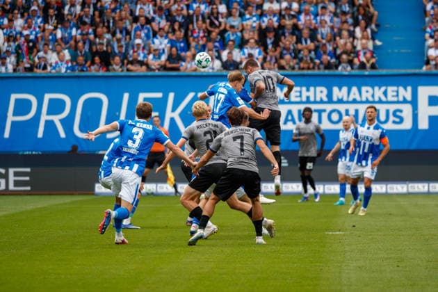 No. 10 Julian Ulbricht (Waldhof) scores a header against Florian Carstens (Rostock) to make it 0–1 GER, FC Hansa Rostock vs. SV Waldhof Mannheim, Soccer, Men, 3rd Division, Matchday 2, 2026–2027 Season, August 16, 2026, Rostock Ostseestadion, Mecklenburg-Western Pomerania, Germany