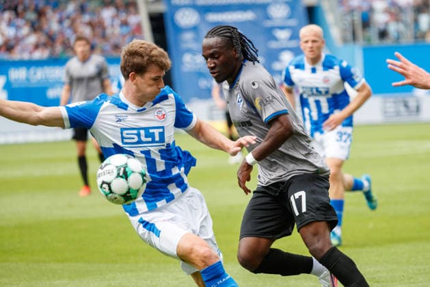 Left: Florian Bohnert (Rostock) vs. Darnell Keumo (Waldhof), GER; FC Hansa Rostock vs. SV Waldhof Mannheim; Soccer; Men; 3rd Division; Matchday 2; 2026–2027 Season; August 16, 2026, Rostock Ostseestadion, Mecklenburg-Western Pomerania, Germany