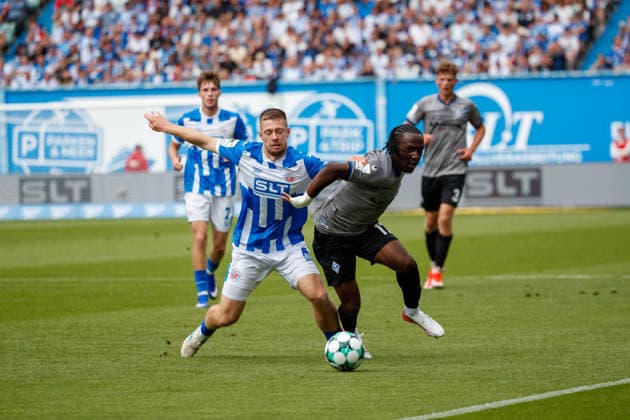 Left: Jonas Dirkner (Rostock) vs. Darnell Keumo (Waldhof), GER; FC Hansa Rostock vs. SV Waldhof Mannheim; Soccer; Men; 3rd Division; Matchday 2; 2026–2027 Season; August 16, 2026, Rostock Ostseestadion, Mecklenburg-Western Pomerania, Germany