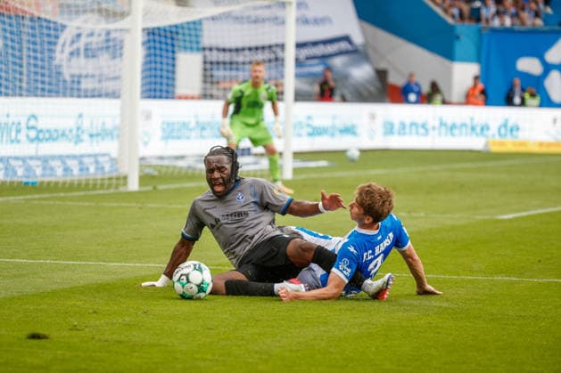 left: Darnell Keumo (Waldhof) vs. Florian Bohnert (Rostock), GER, FC Hansa Rostock vs. SV Waldhof Mannheim, Soccer, Men, 3rd Division, Matchday 2, 2026–2027 Season, August 16, 2026, Rostock Ostseestadion, Mecklenburg-Western Pomerania, Germany