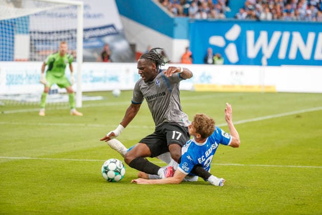 left: Darnell Keumo (Waldhof) vs. Florian Bohnert (Rostock), GER, FC Hansa Rostock vs. SV Waldhof Mannheim, Soccer, Men, 3rd Division, Matchday 2, 2026–2027 Season, August 16, 2026, Rostock Ostseestadion, Mecklenburg-Western Pomerania, Germany