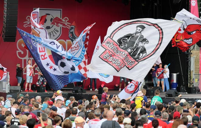 RB Leipzig – Bundesliga Season Opener, Leipzig, August 16, 2026, Festwiese in front of the Red Bull Arena, Soccer, Bundesliga 1, RB Leipzig, Season Opener, Pictured: Season Heat Up 2026 stage with fan flags, For editorial use only, Picture Point