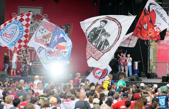 RB Leipzig – Bundesliga Season Opener, Leipzig, August 16, 2026, Festwiese in front of the Red Bull Arena, Soccer, Bundesliga 1, RB Leipzig, Season Opener, Pictured: Season Heat Up 2026 stage with fan flags, For editorial use only, Picture Point