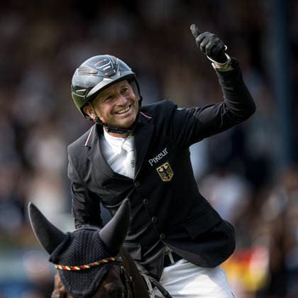 August 16, 2026: Michael Jung of Germany, riding his horse fischerChipmunk, celebrates during the Eventing Show Jumping Final on Day 6 of the 2026 FEI World Championships in Aachen. 2026 in Aachen. Photo by Emma Wallskog, BILDBYRAN, code EW EW0687. equestrian sports, riding, 2026 World Championships, 2026 FEI World Championships, BBENG, equestrian sports, World Championships, eventing, celebration  Copyright: EMMAxWALLSKOG BB260816EW038