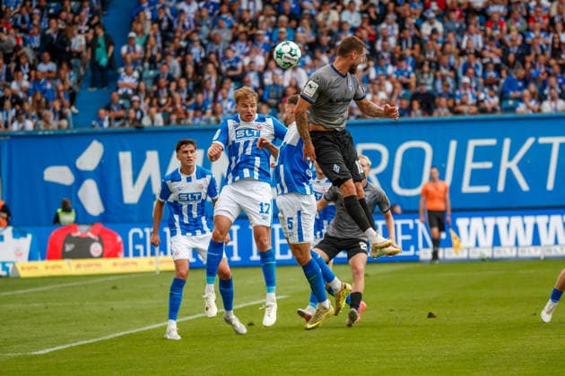 Front row, from left: Florian Carstens (Rostock), Marco Schuster (Rostock), and Julian Ulbricht (Waldhof, GER); FC Hansa Rostock vs. SV Waldhof Mannheim; Soccer; Men; 3rd Division; Matchday 2; 2026–2027 season; August 16, 2026, Rostock Ostseestadion, Mecklenburg-Western Pomerania, Germany