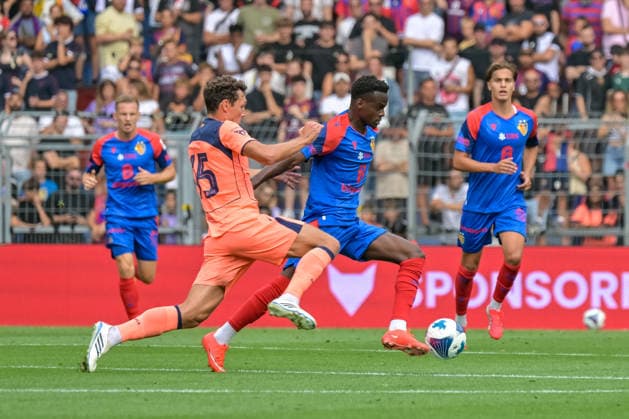 Andreas Christensen, FC Barcelona, 15, Abemly Meto Silu Metinho, FC Basel, 05 on the ball (GER), FC Basel vs. FC Barcelona, soccer, friendly match, 2026–2027 season, August 16, 2026 GER, FC Basel vs. FC Barcelona, soccer, friendly match, 2026–2027 season, August 16, 2026 Basel Copyright: xEibner-Pressefotox EP_THS