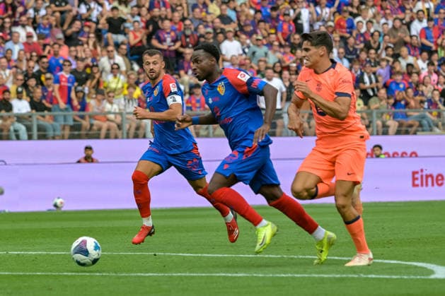 Philip Otele (FC Basel), No. 7, in possession of the ball and in a footrace with Andreas Christensen (FC Barcelona), No. 15, GER, FC Basel vs. FC Barcelona, soccer, friendly match, 2026–2027 season, August 16, 2026 GER, FC Basel vs. FC Barcelona, soccer, friendly match, 2026–2027 season, August 16, 2026 Basel Copyright: xEibner-Pressefotox EP_THS