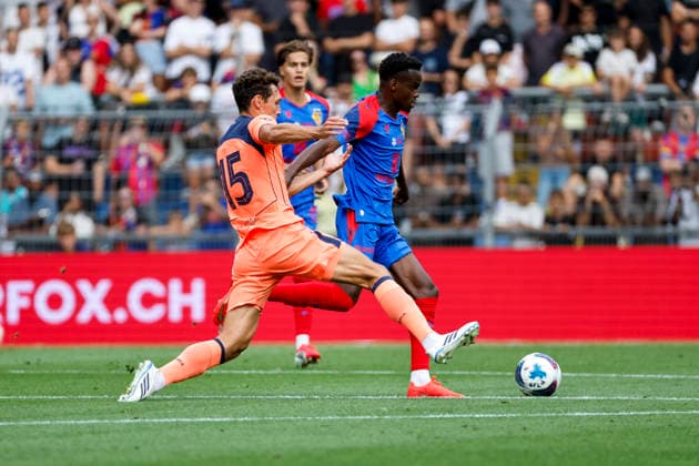 Andreas Christensen (FC Barcelona, 15) and Metinho (FC Basel, 05) in a tackle, Switzerland, soccer, friendly match, 2026–2027, FC Basel vs. FC Barcelona, August 16, 2026, St. Jakob Park, Basel, Switzerland Copyright: xGrantxHubbsx