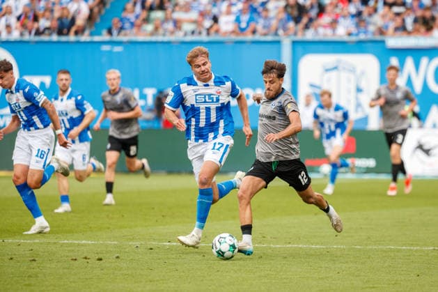 Vincent Thill (Waldhof) vs. Florian Carstens (Rostock) GER, FC Hansa Rostock vs. SV Waldhof Mannheim, Soccer, Men, 3rd Division, Matchday 2, 2026–2027 Season, August 16, 2026, Rostock Ostseestadion, Mecklenburg-Western Pomerania, Germany