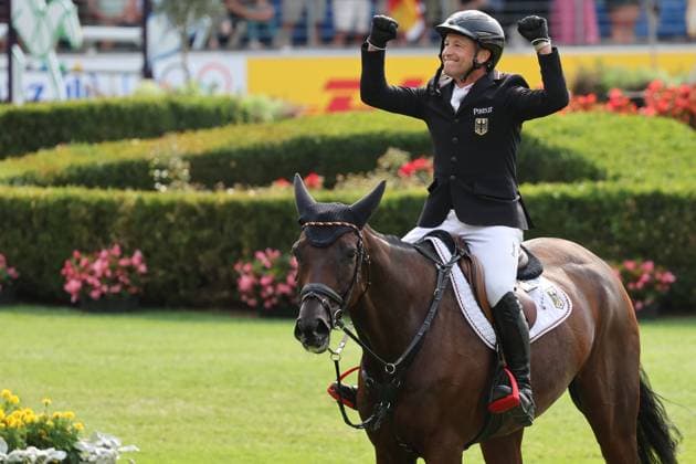 1st place, World Champion Michael Jung GER, Germany, riding fischerChipmunk FRH, Chipmunk FRH, excitement, celebration, eventing, FEI Eventing World Championship, DHL Prize, Individual and Team, AACHEN FEI World Championships 2026, World Festival of Equestrian Sports, 2026 Equestrian World Championships, Aachen 2026, Welcome Home 2026, Aachen Soers, August 11–23, 2026, Equestrian Sports, August 16, 2026, Aachen Soers, Germany