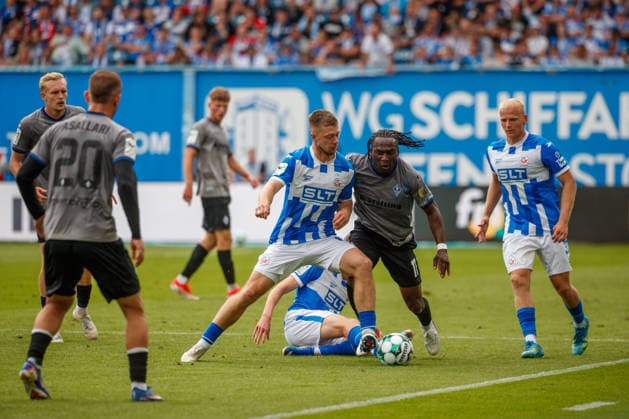 Left: Jonas Dirkner (Rostock) vs. Darnell Keumo (Waldhof), GER; FC Hansa Rostock vs. SV Waldhof Mannheim; Soccer; Men; 3rd Division; Matchday 2; 2026–2027 Season; August 16, 2026, Rostock Ostseestadion, Mecklenburg-Western Pomerania, Germany