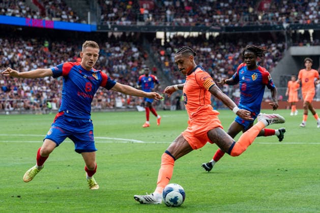 Soccer, Friendly Match: FC Basel 1893 vs. FC Barcelona, Sunday, August 16, 2026, St. Jakob Park, Basel, Switzerland. Captain Raphinha (11) sets up the 1-0 goal for FC Barcelona, and Karim Adeyemi (14), FC Barcelona scores against Becir Omeragic (4), FC Basel Copyright: xValentinxDomgjonix