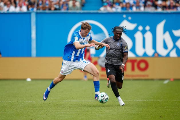 Left: Bernie Lennemann (Rostock) vs. Darnell Keumo (Waldhof), GER; FC Hansa Rostock vs. SV Waldhof Mannheim; Soccer; Men; 3rd Division; Matchday 2; 2026–2027 Season; August 16, 2026, Rostock Ostseestadion, Mecklenburg-Western Pomerania, Germany