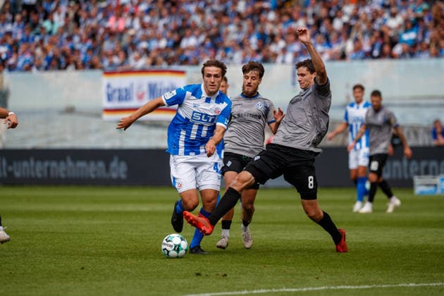 Left: Benno Dietze (Rostock) vs. Maximilian Thalhammer (Waldhof), FC Hansa Rostock vs. SV Waldhof Mannheim, Soccer, Men, 3rd Division, Matchday 2, 2026–2027 Season, August 16, 2026, Rostock Ostseestadion, Mecklenburg-Western Pomerania, Germany