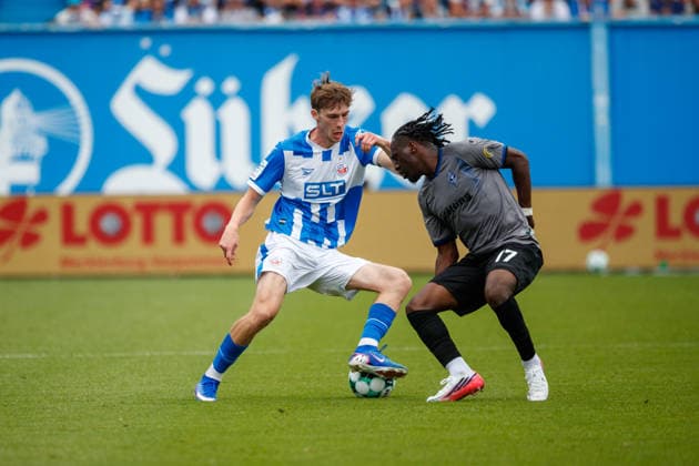 Left: Bernie Lennemann (Rostock) vs. Darnell Keumo (Waldhof), GER; FC Hansa Rostock vs. SV Waldhof Mannheim; Soccer; Men; 3rd Division; Matchday 2; 2026–2027 Season; August 16, 2026, Rostock Ostseestadion, Mecklenburg-Western Pomerania, Germany