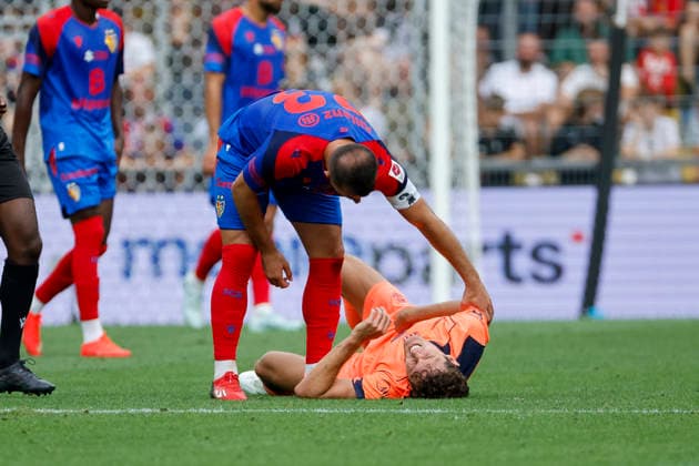 Marc Bernal, FC Barcelona, 22, injured on the ground, Switzerland, soccer, friendly match, 2026–2027, FC Basel vs. FC Barcelona, August 16, 2026, St. Jakob Park, Basel, Switzerland Copyright: xGrantxHubbsx
