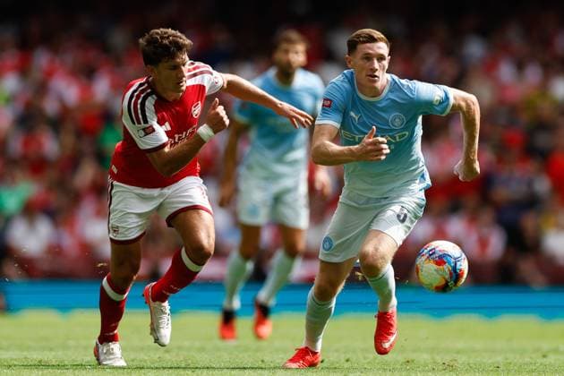 Elliot Anderson of Manchester City gets away from Christos Tzolis of Arsenal Arsenal v Manchester City, FA Community Shield, Principality Stadium, Cardiff, UK - 16 Aug 2026Cardiff Principality Stadium United Kingdom EDITORIAL USE ONLY No use with unauthorised audio, video, data, fixture lists, club league logos or live services. Online in-match use limited to 120 images, no video emulation. No use in betting, games or single club league player publications. Copyright: xMattxImpey Shutterstockx 17096419ce