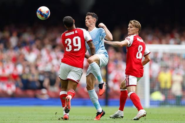 Phil Foden of Manchester City (middle) battles for the ball with Bruno Guimaraes of Arsenal (left) and Martin Odegaard (right) Arsenal v Manchester City, FA Community Shield, Principality Stadium, Cardiff, UK - 16 Aug 2026Cardiff Principality Stadium United Kingdom EDITORIAL USE ONLY No use with unauthorised audio, video, data, fixture lists, club league logos or live services. Online in-match use limited to 120 images, no video emulation. No use in betting, games or single club league player publications. Copyright: xMattxImpey Shutterstockx 17096419bt