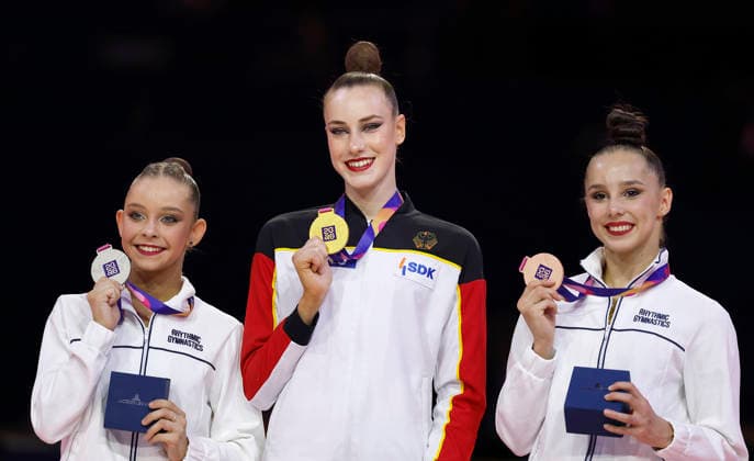 Medal Ceremony for the Ball Final at the 2026 Rhythmic Gymnastics World Championships in Frankfurt am Main, Germany, on August 16, 2026: from left, Sofija Ilterjakowa (Neutral Athlete), silver; Darja Varfolomeev (Germany), gold; and Mariia Borisowa (Neutral Athlete), bronze, with their medals. Medal ceremony for the ball final at the 2026 Rhythmic Gymnastics World Championships in Frankfurt am Main, Germany, on August 16, 2026; from left to right: Sofija Ilterjakowa, individual neutral athlete, silver; Darja Varfolomeev, Germany, gold; and Mariia Borisowa, individual neutral athlete, bronze, with their medals Copyright: HMBxMedia xHeikoxBecker