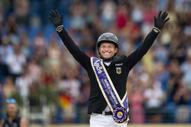 August 16, 2026: Michael Jung of Germany, riding FischerChipmunk, celebrates on the podium with his gold medal after the Eventing Show Jumping Final on Day 6 of the 2026 FEI World Championships, 2026 in Aachen. Photo by Emma Wallskog. BILDBYRAN code EW EW0687. equestrian sports, 2026 World Championships, 2026 FEI World Championships, BBENG, equestrian sports, World Championships, eventing, celebration, gold  Copyright: EMMAxWALLSKOG BB260816EW043