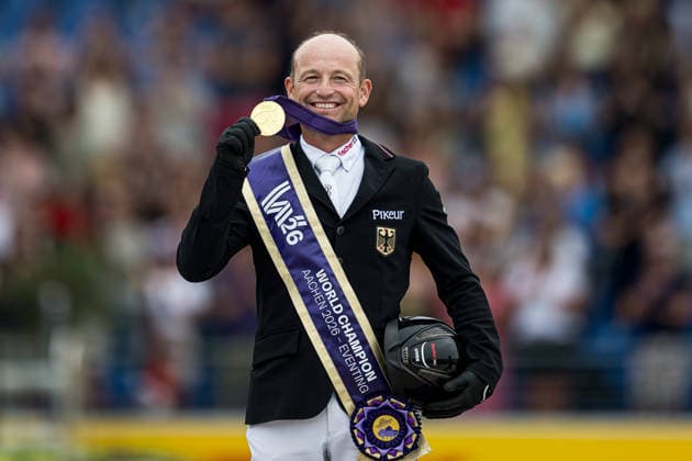 August 16, 2026: Michael Jung of Germany, riding FischerChipmunk, celebrates on the podium with his gold medal after the Eventing Show Jumping Final on Day 6 of the 2026 FEI World Championships, 2026 in Aachen. Photo by Emma Wallskog. BILDBYRAN code EW EW0687. equestrian sports, 2026 World Championships, 2026 FEI World Championships, BBENG, equestrian sports, World Championships, eventing, celebration, gold  Copyright: EMMAxWALLSKOG BB260816EW044